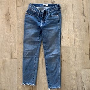 Madewell button-fly 10” high-rise skinny jeans.